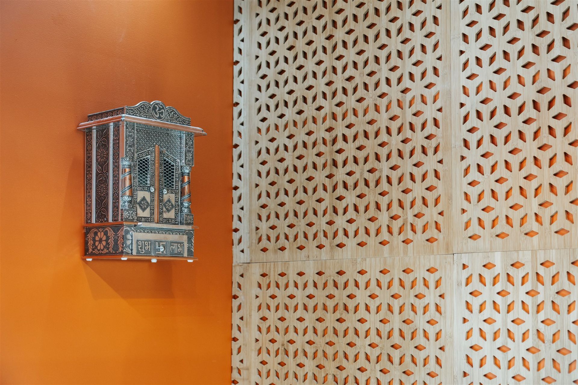 A Temple is Hanging on a Wall Next to a Wall With a Pattern on It — Moltus Construction in Braddon,  ACT