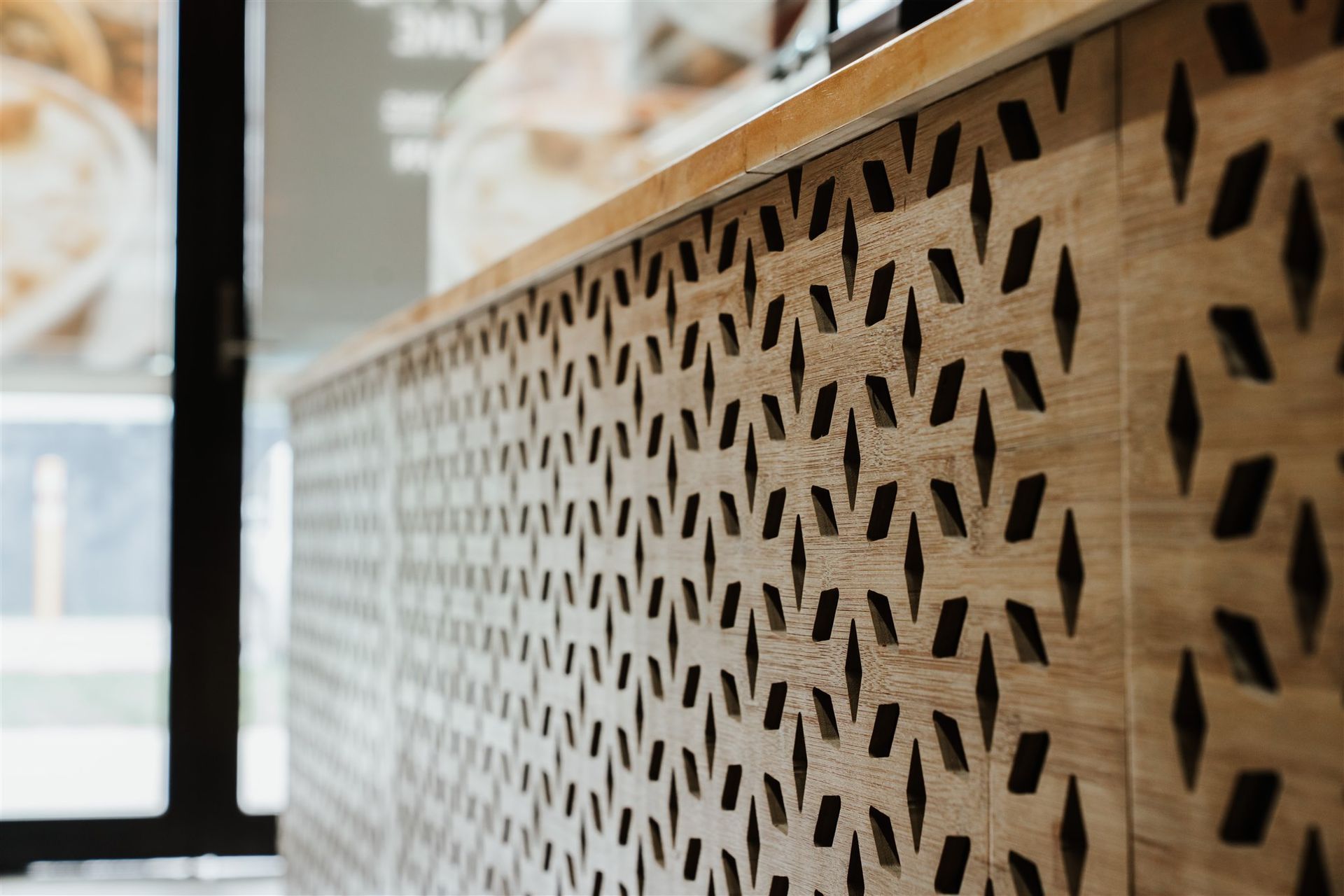 A Close Up of a Wooden Wall With a Pattern on It — Moltus Construction in Braddon,  ACT