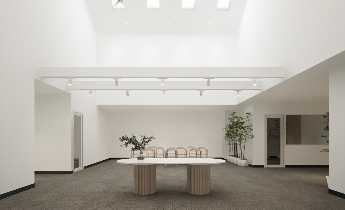 There is a Table in the Middle of the Room With a Plant on It — Moltus Construction in Braddon, ACT