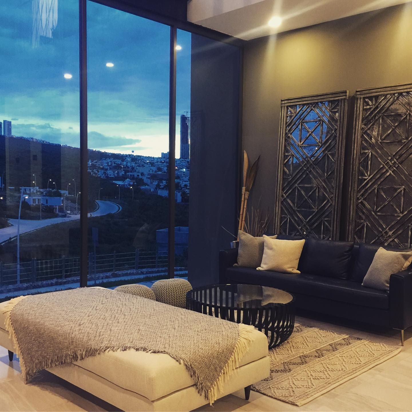 A Living Room with a Black and Grey Couch  — Moltus Construction in Braddon, ACT