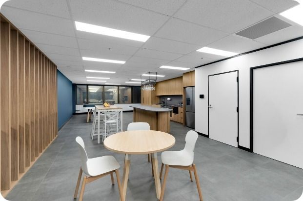 A Room With a Table and Chairs in It — Moltus Construction in Braddon,  ACT