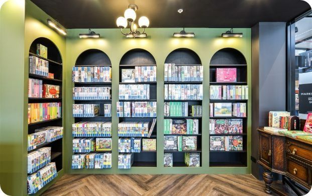 A Room With a Lot of Books on the Shelves — Moltus Construction in Braddon,  ACT