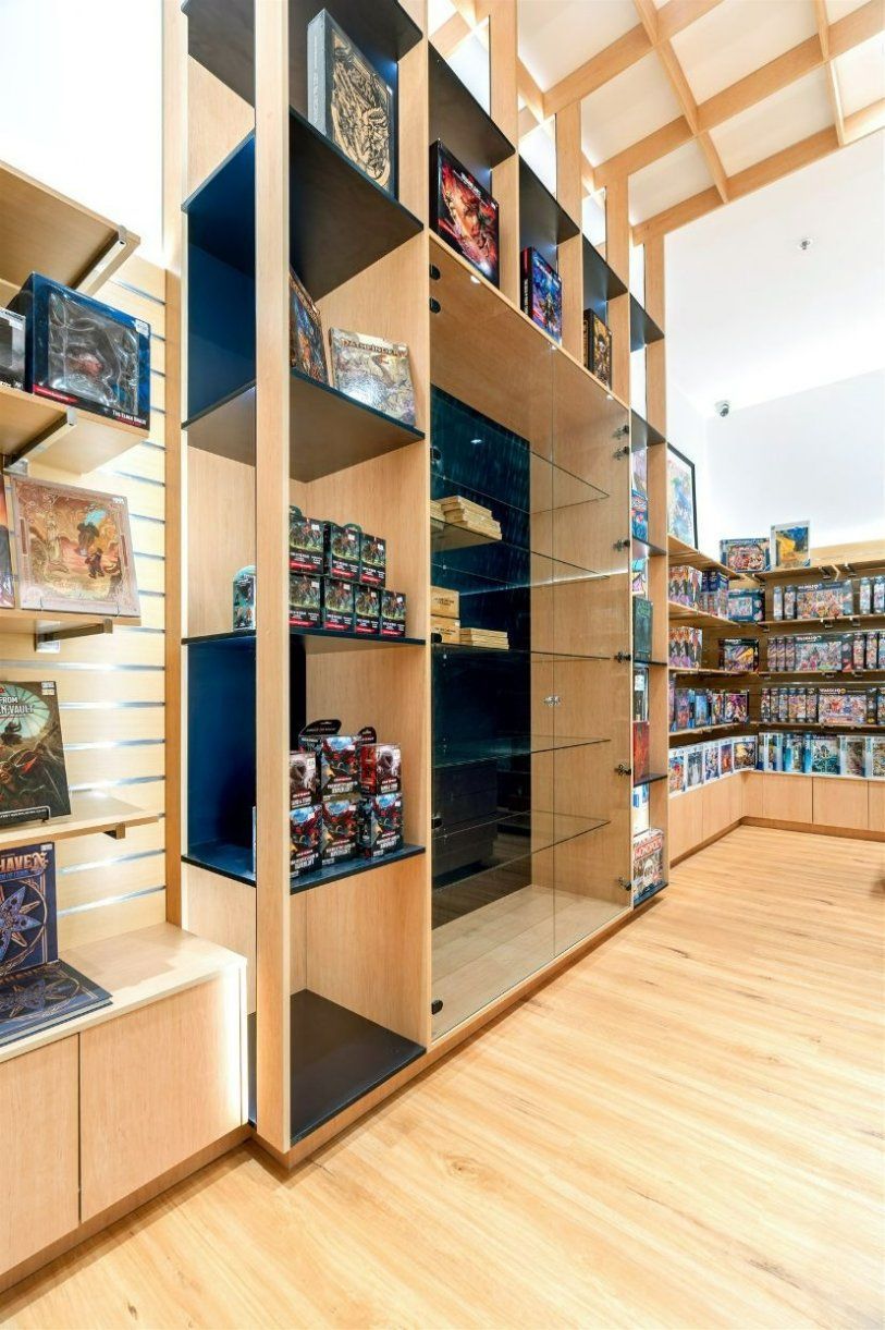 A Store Filled With Lots of Shelves Filled With Toys — Moltus Construction in Braddon,  ACT