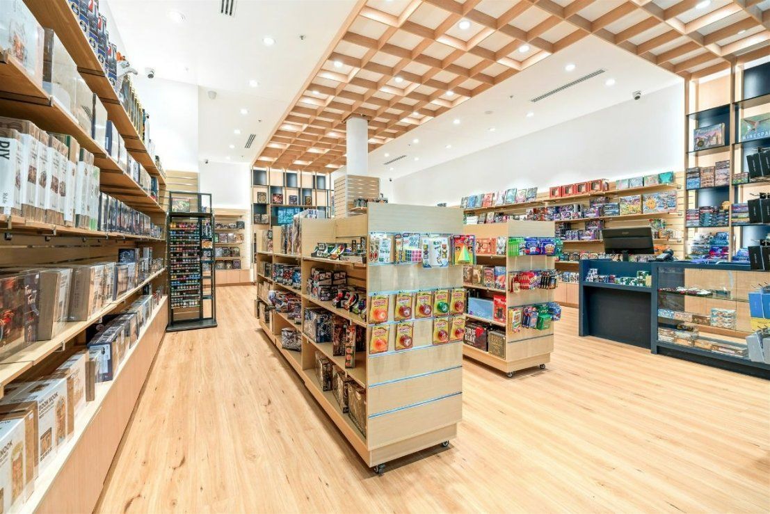 A Store Filled With Lots of Shelves and Toys — Moltus Construction in Braddon,  ACT