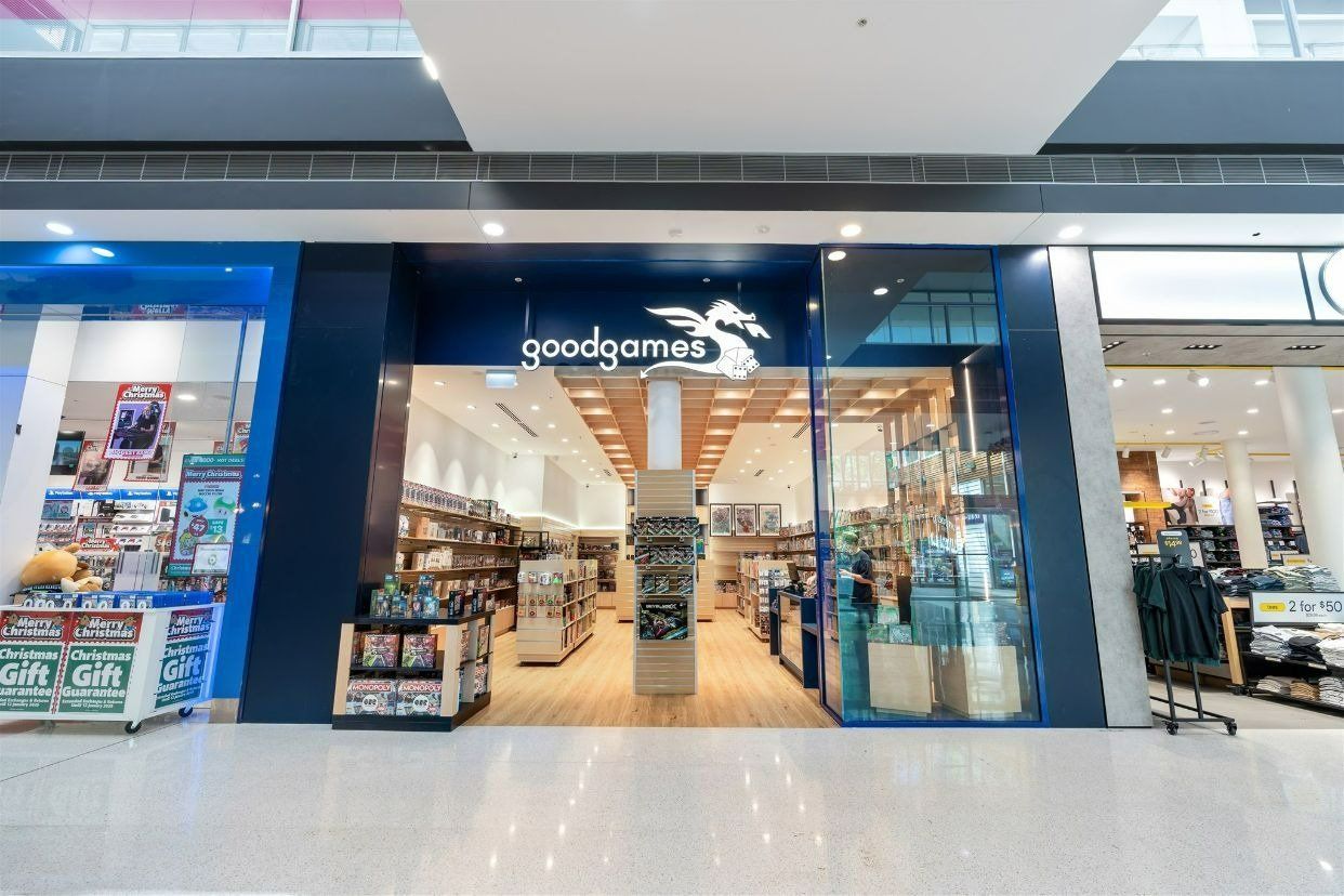 A Store in a Mall With a Blue Sign That Says Goodgamer — Moltus Construction in Braddon,  ACT