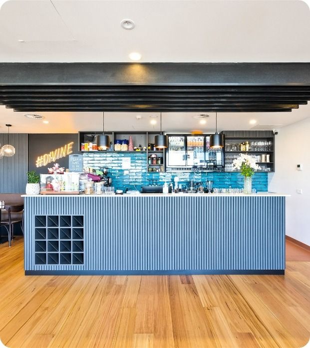 A Kitchen With A Sign That Says #drink On It — Moltus Construction in Braddon, ACT