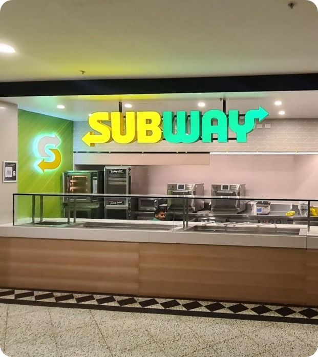 A Subway Restaurant With a Counter in Front of It — Moltus Construction in Braddon,  ACT