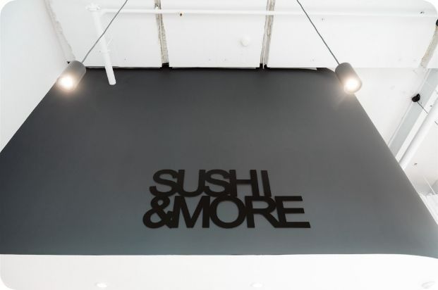 A Sign for Sushi & More Hangs From the Ceiling — Moltus Construction in Braddon,  ACT