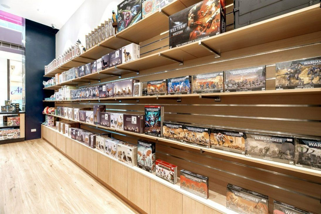 A Store Filled With Shelves Filled With Lots of Games — Moltus Construction in Braddon,  ACT
