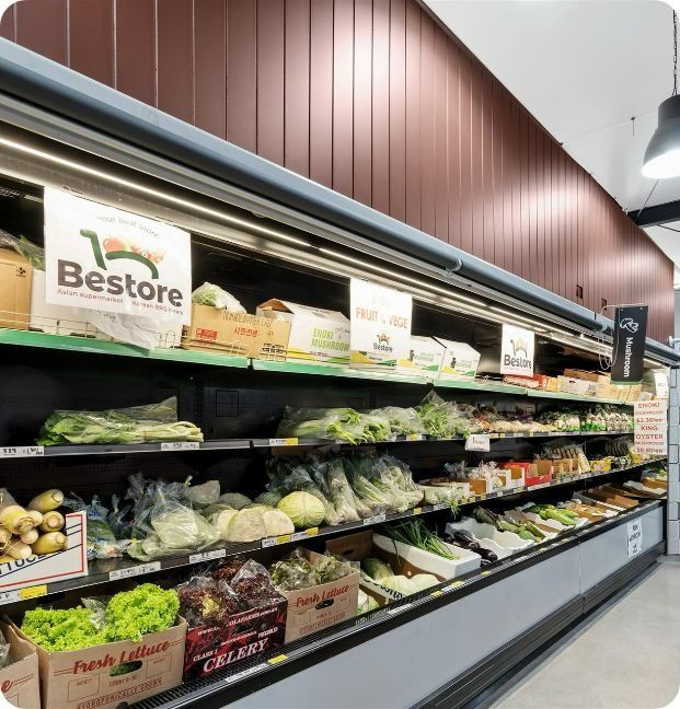 A Grocery Store With a Sign That Says Bestore on It — Moltus Construction in Braddon,  ACT