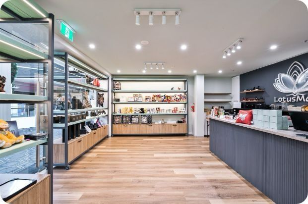 A Store With a Sign That Says Lotus on It — Moltus Construction in Braddon,  ACT