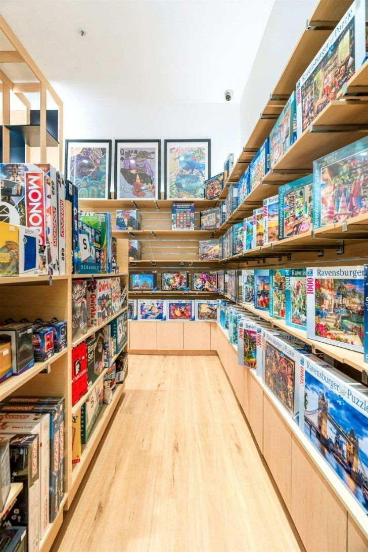 A Long Aisle in a Toy Store Filled With Lots of Toys — Moltus Construction in Braddon,  ACT