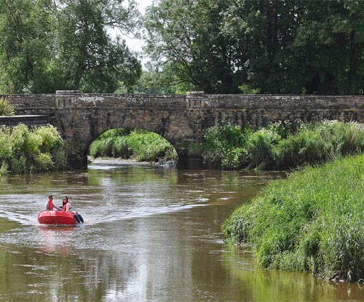 A boat by Amberly bridge