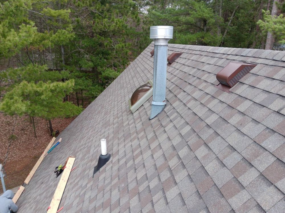 a roof with a chimney on top of it