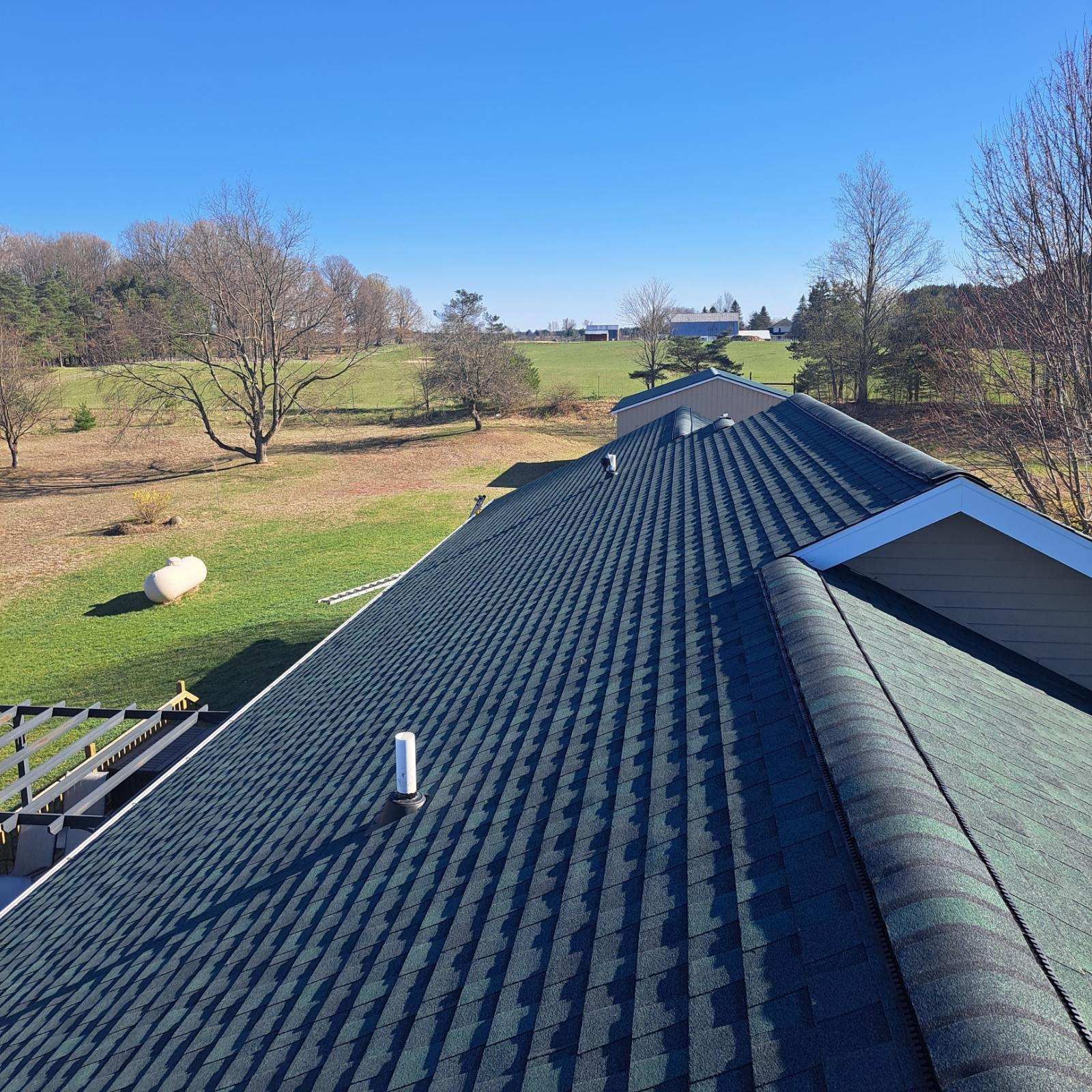 The roof of a house with a lot of shingles on it.