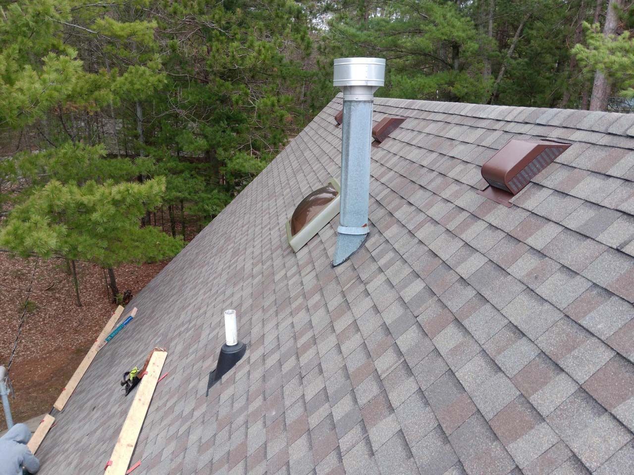 A roof with a chimney on top of it