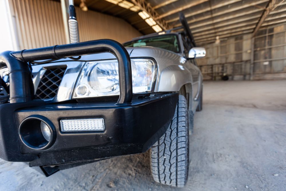 A Silver Nissan Patrol SUV With A Black Bull Bar — Auto Inspections & Road Services N.T. in Woolner, NT