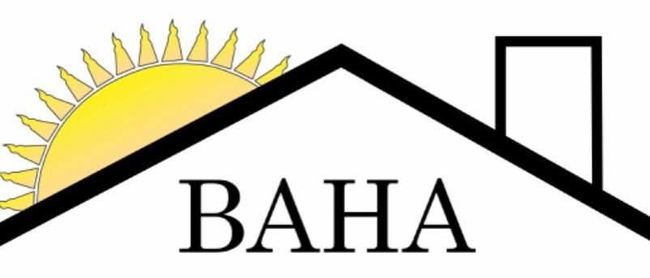 Logo with house outline, sun graphic, and the text 