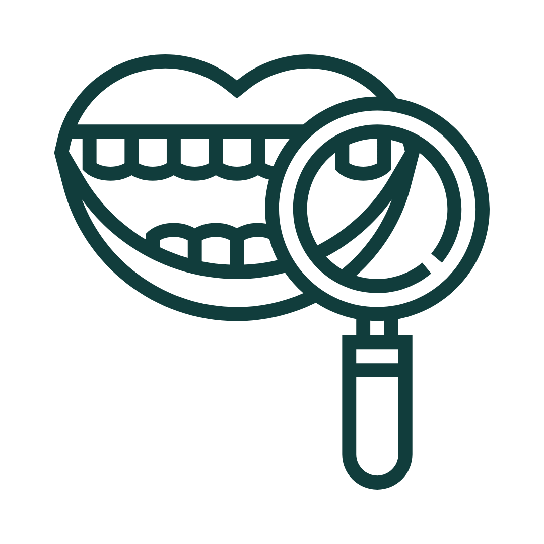 Teeth being examined with a magnifying glass, representing a dental check-up.