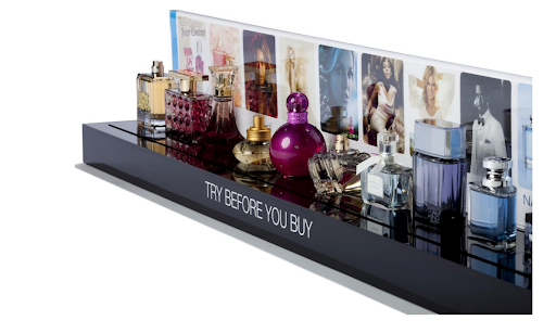A perfume sample retail display case