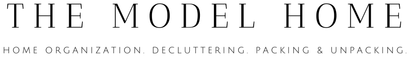 A black and white logo for the model home