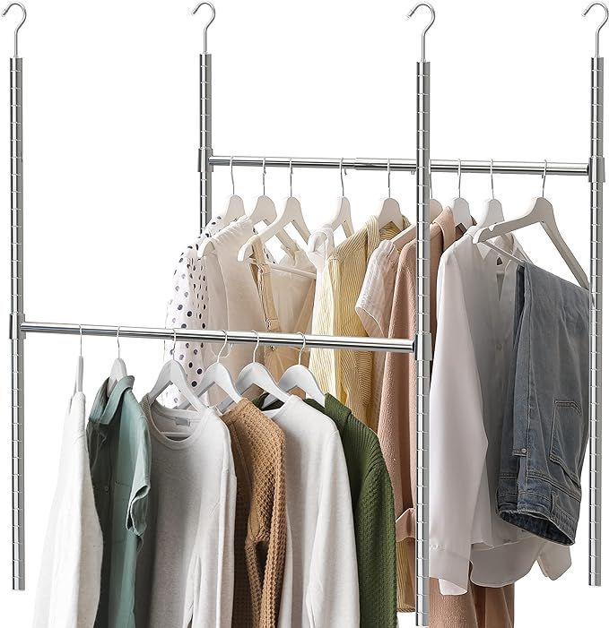 A clothes rack filled with clothes hanging on hangers.
