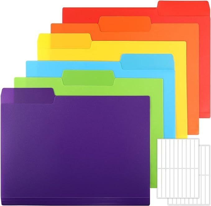 A bunch of colorful folders stacked on top of each other on a white background.