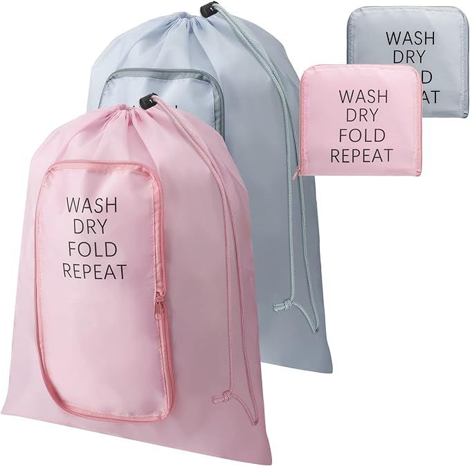 A set of three drawstring bags that say `` wash dry fold repeat ''.