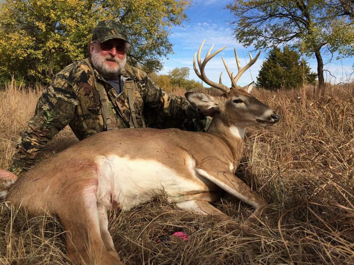 Dave B. on his Salt Fork Hunt pictured with the buck he harvested