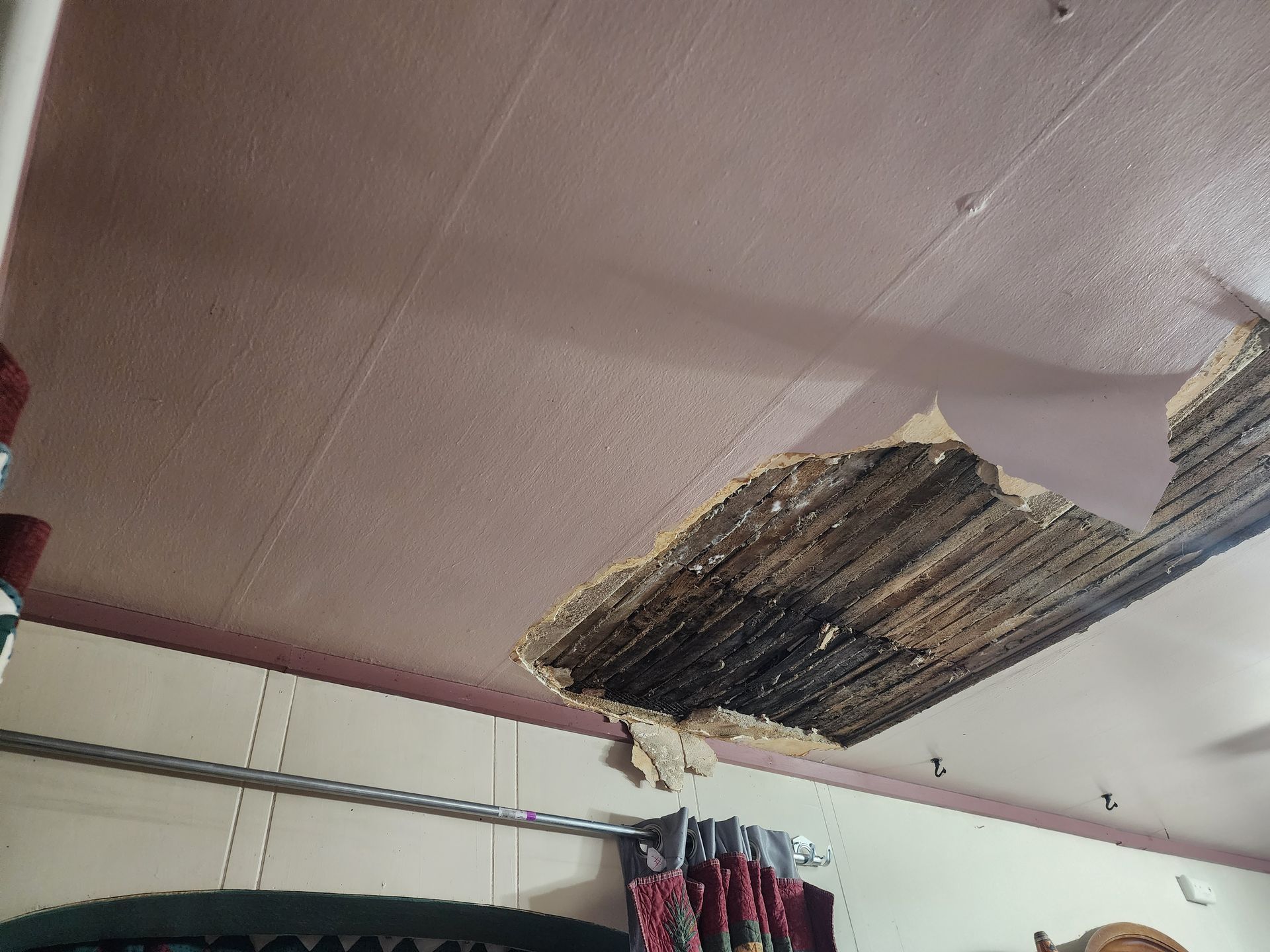 Ellingson Roofing LLC - interior damage, roof leak
