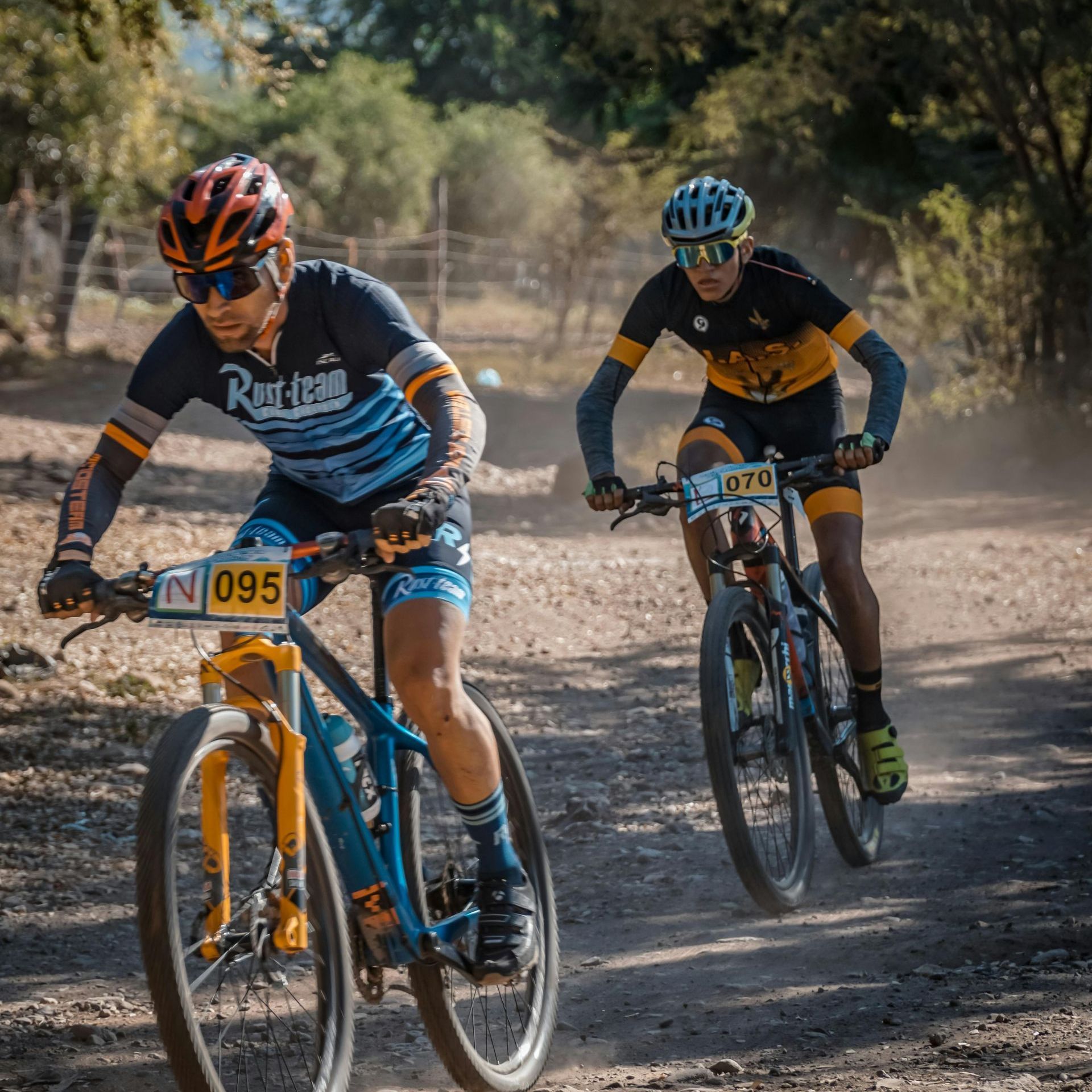 2 adults mountain biking