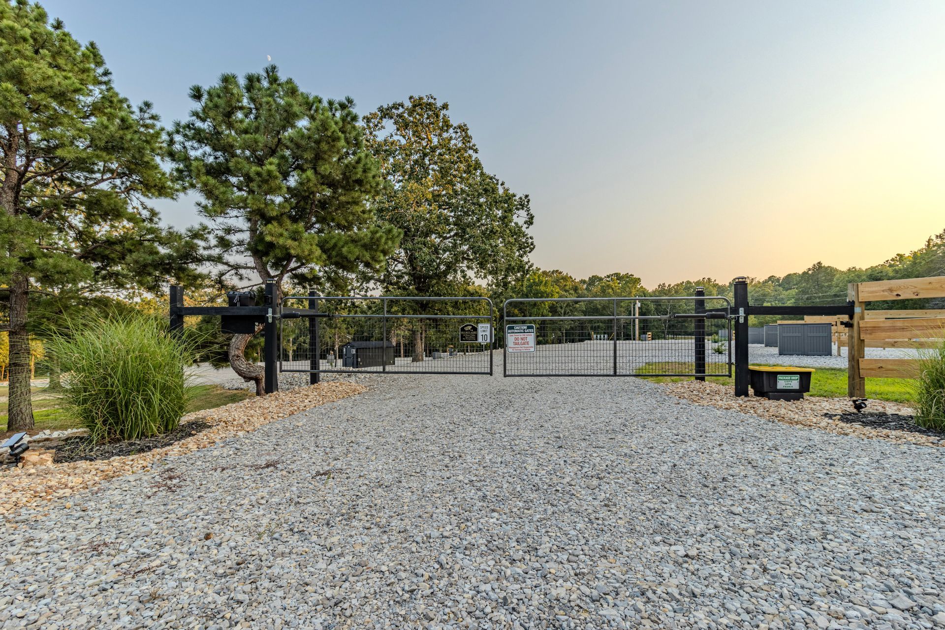 security gate at whiter river vacation rv resort with mature landscaping
