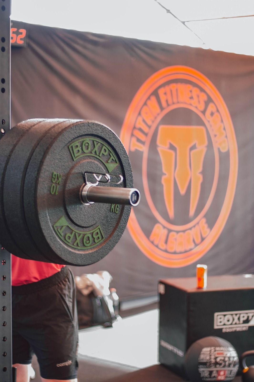 A group of people are riding bicycles down a curvy road.
