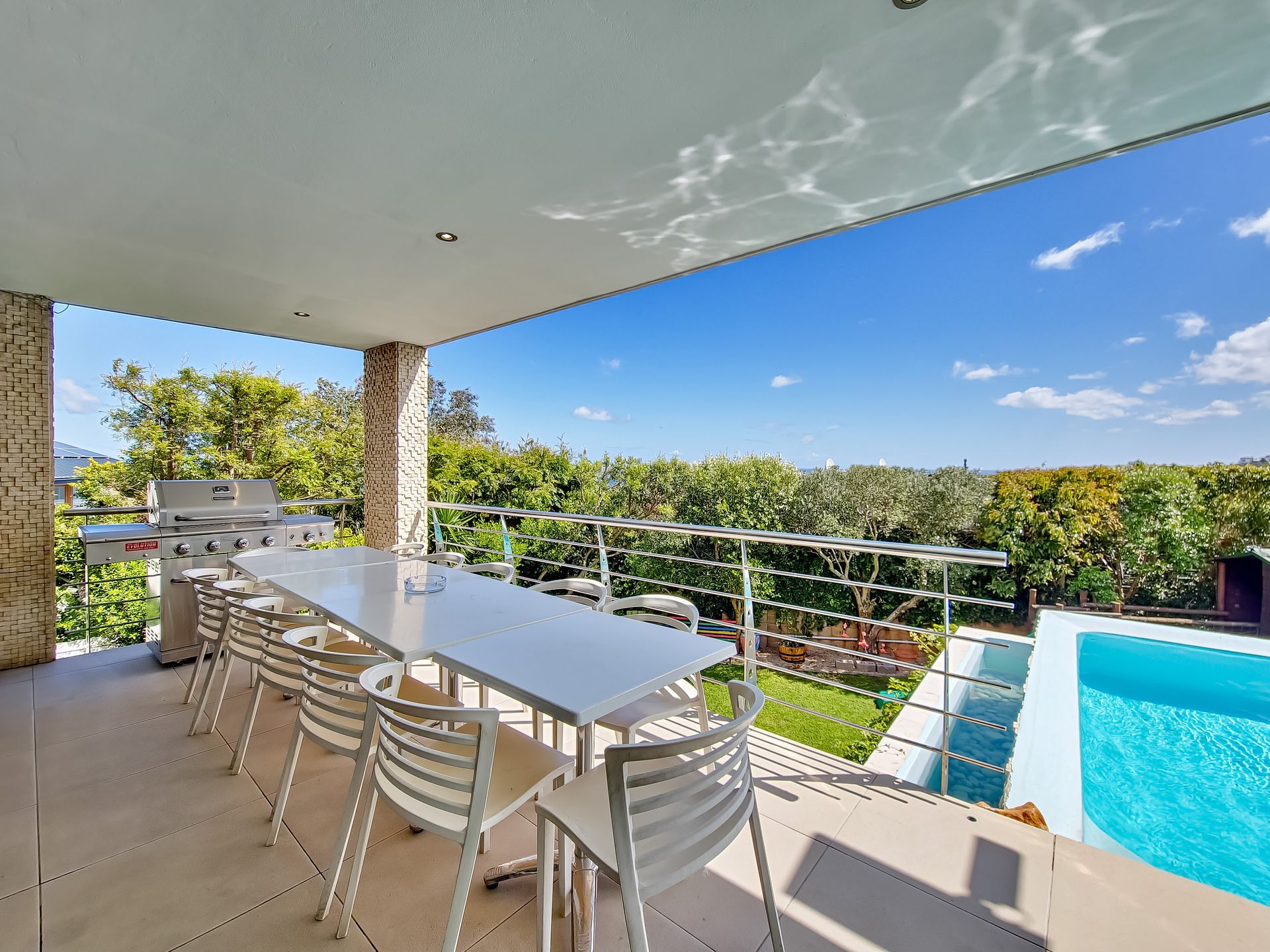 A group of people are riding bicycles down a curvy road.