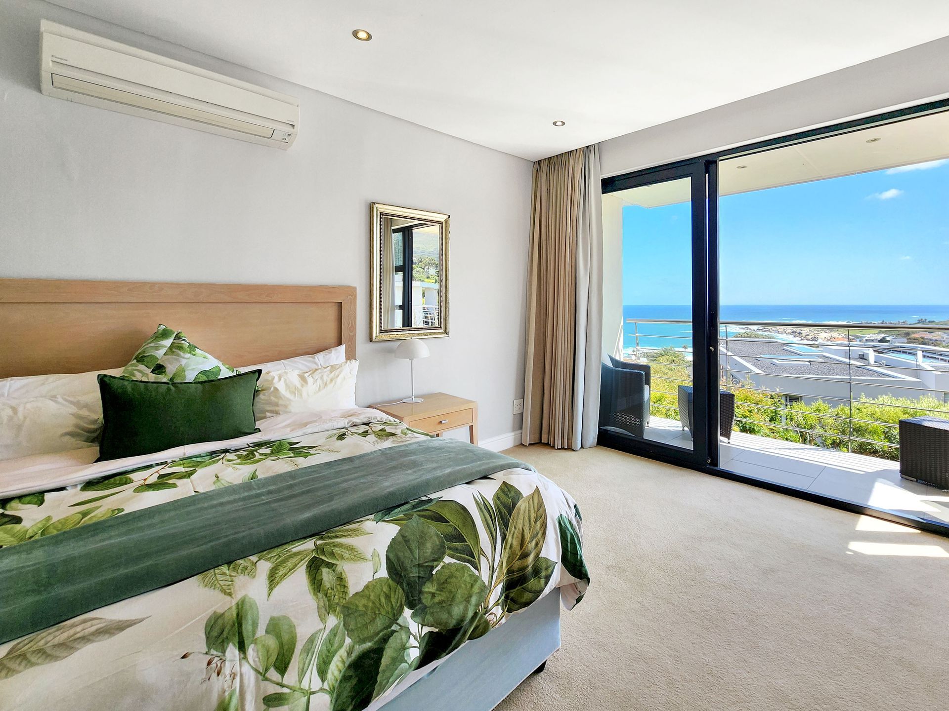 A group of people are riding bicycles down a curvy road.