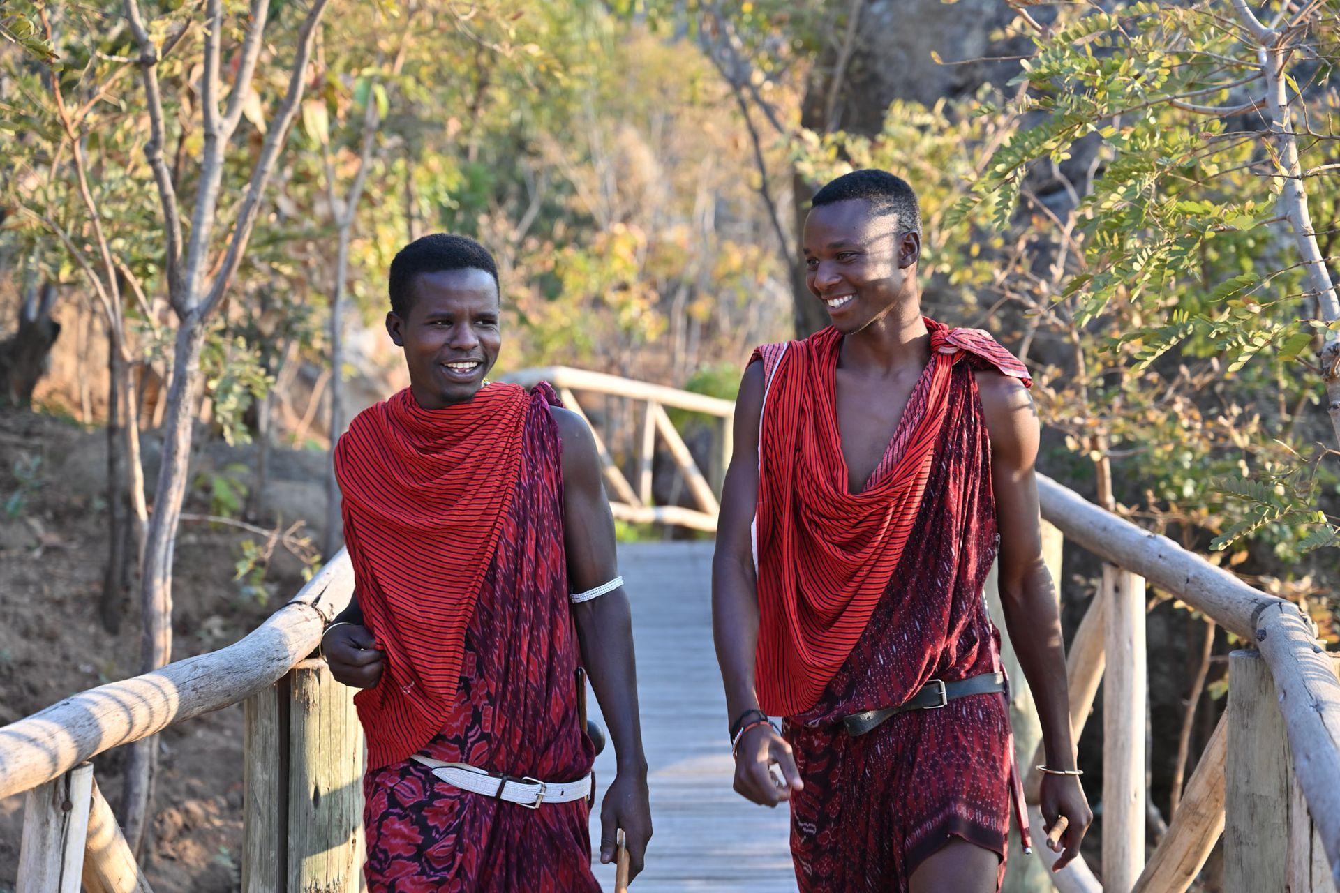 An aerial view of a tennis court in a city