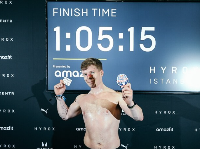 Yoga teacher smiling in a shala