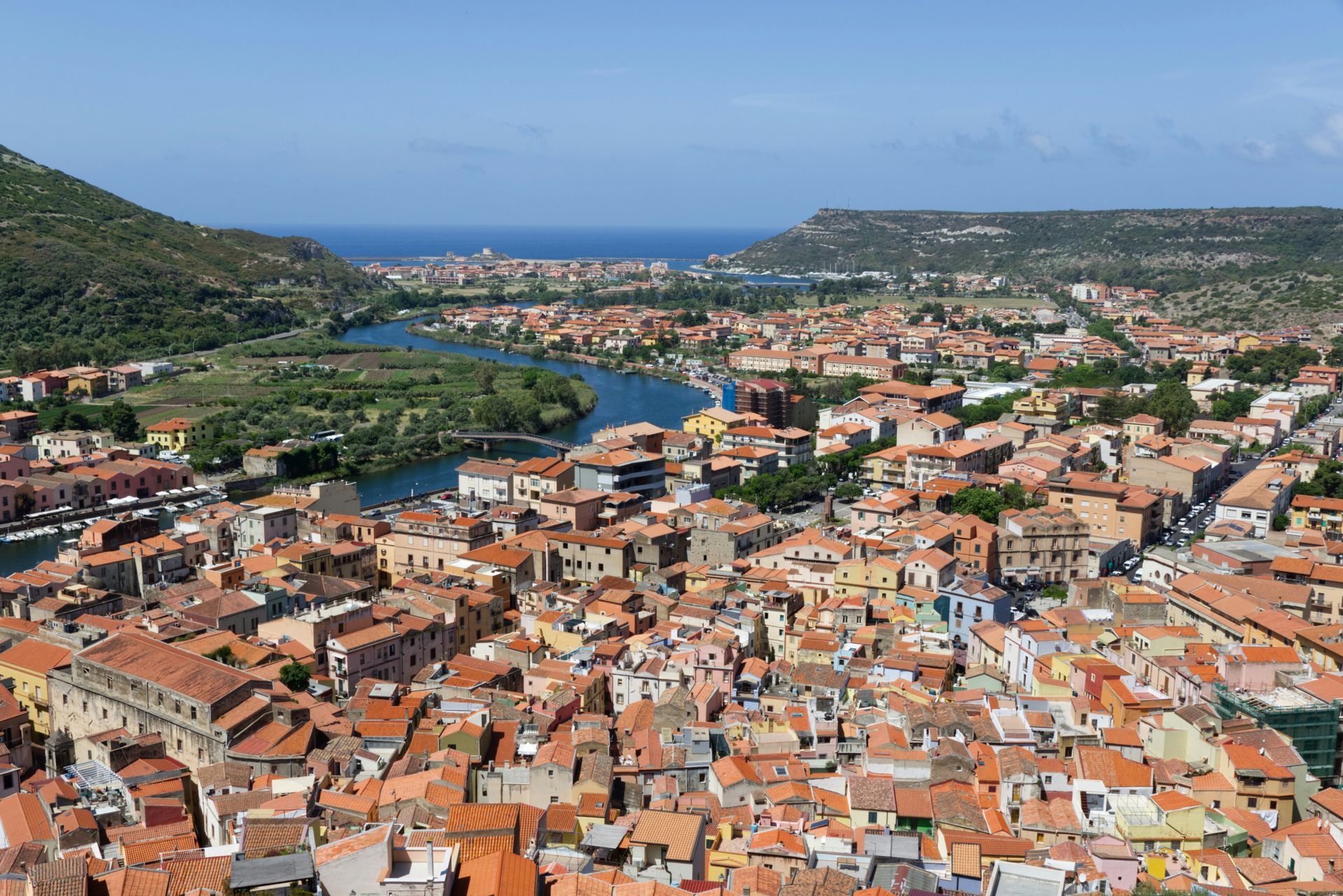 An aerial view of a city with a river running through it