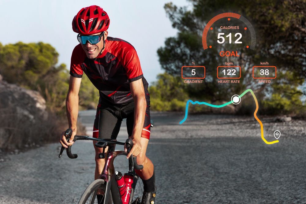A man is riding a bike down a road.