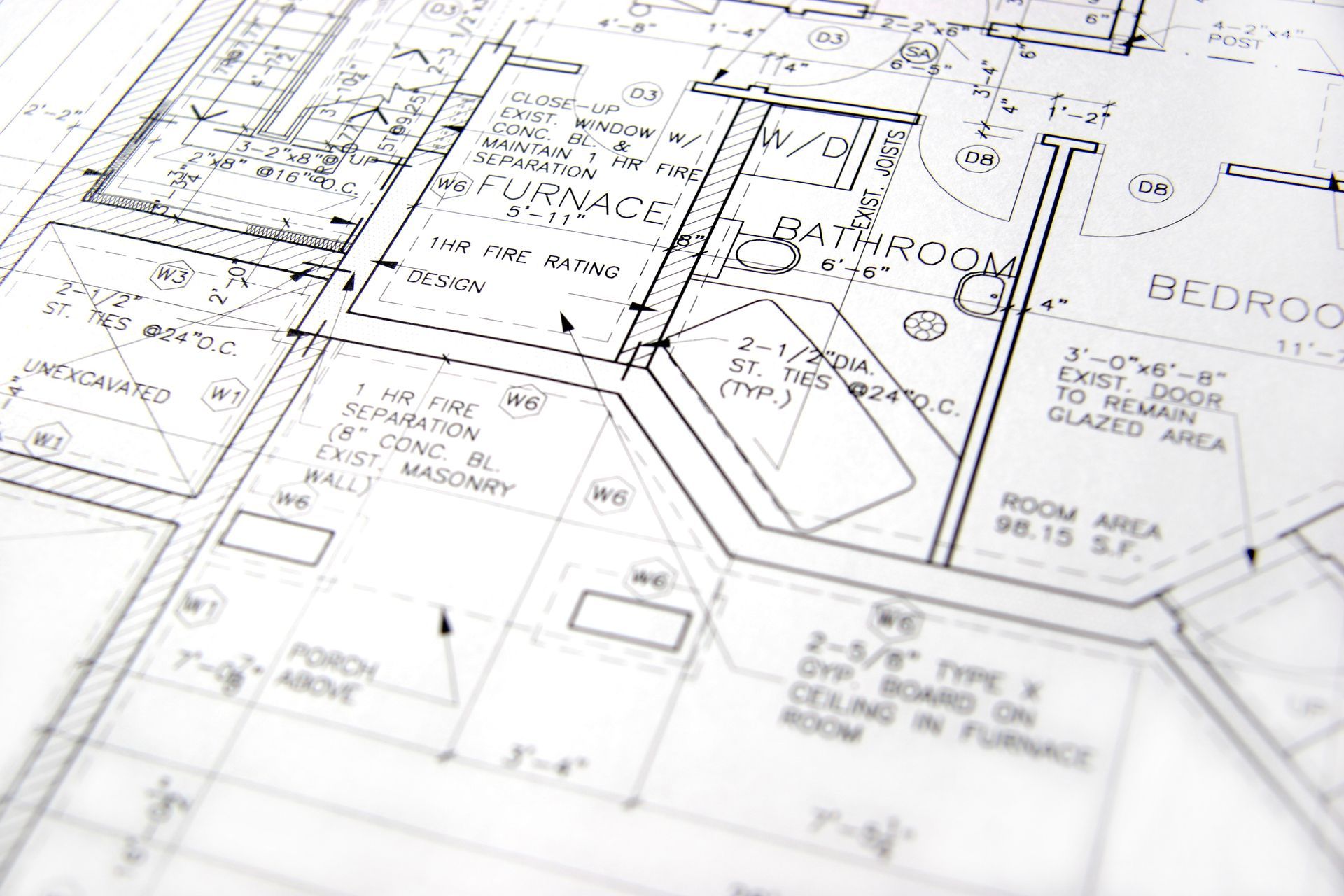 There is a fireplace in the middle of the room in the basement.