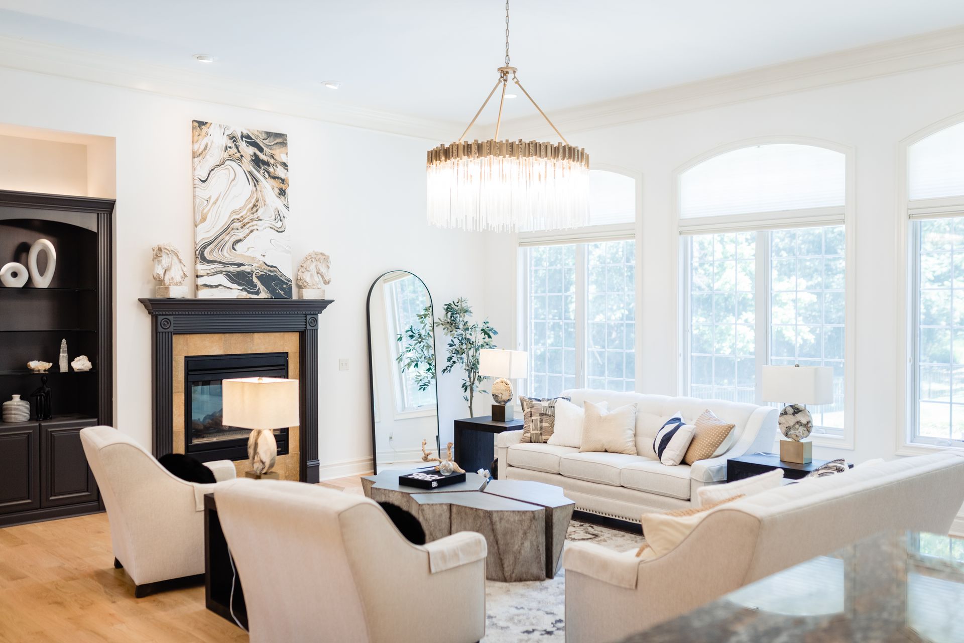 A living room with a couch , coffee table , and rug.