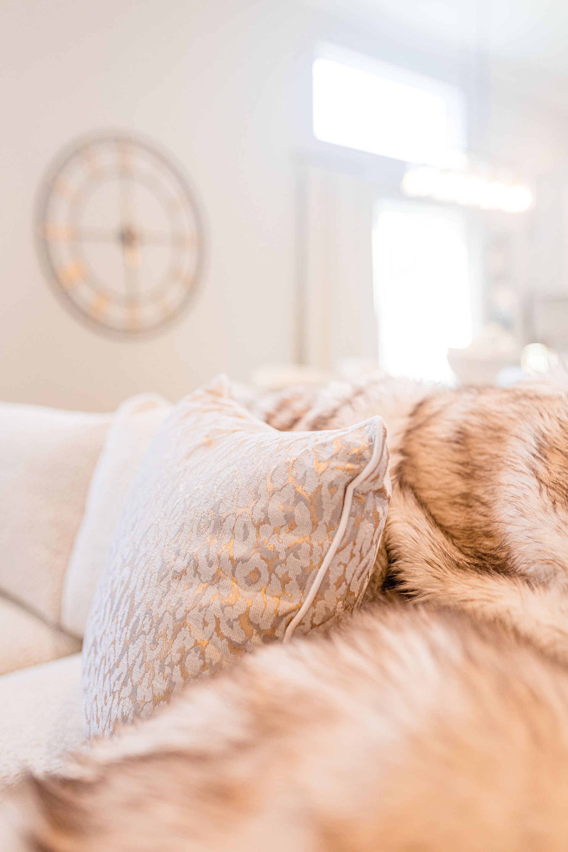 A group of people are sitting at a table looking at paint samples.