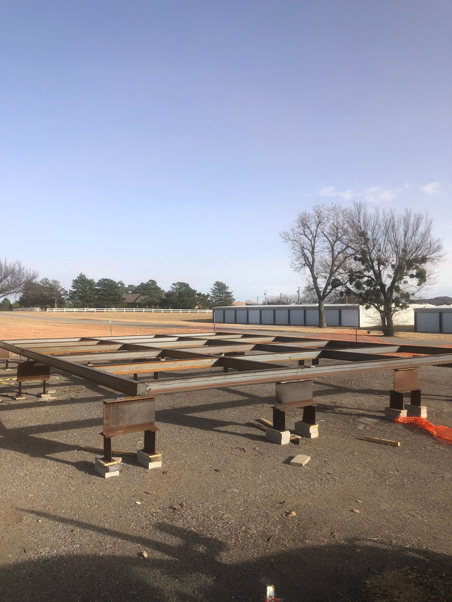 A construction site with a blue sky in the background