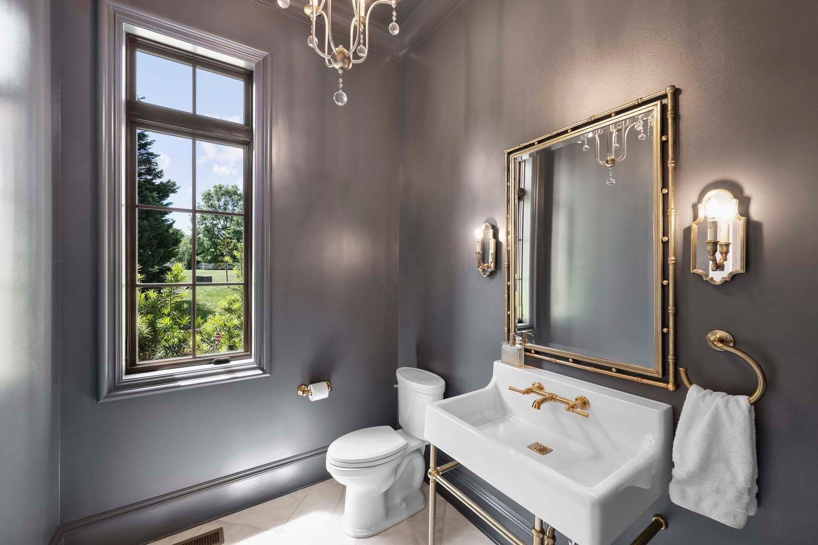 Luxurious Bathroom With Gold Chandelier — Charlotte, NC — Harland Building Group