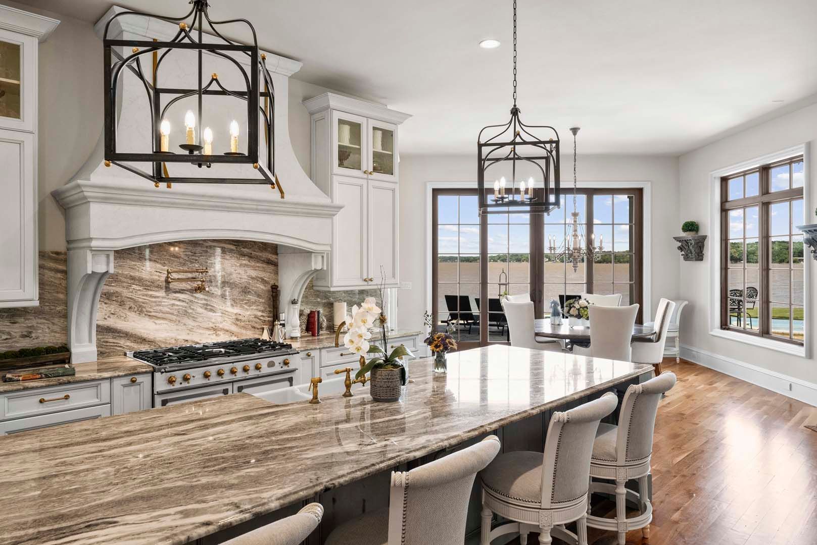 Kitchen With Elegant Marble Table — Charlotte, NC — Harland Building Group