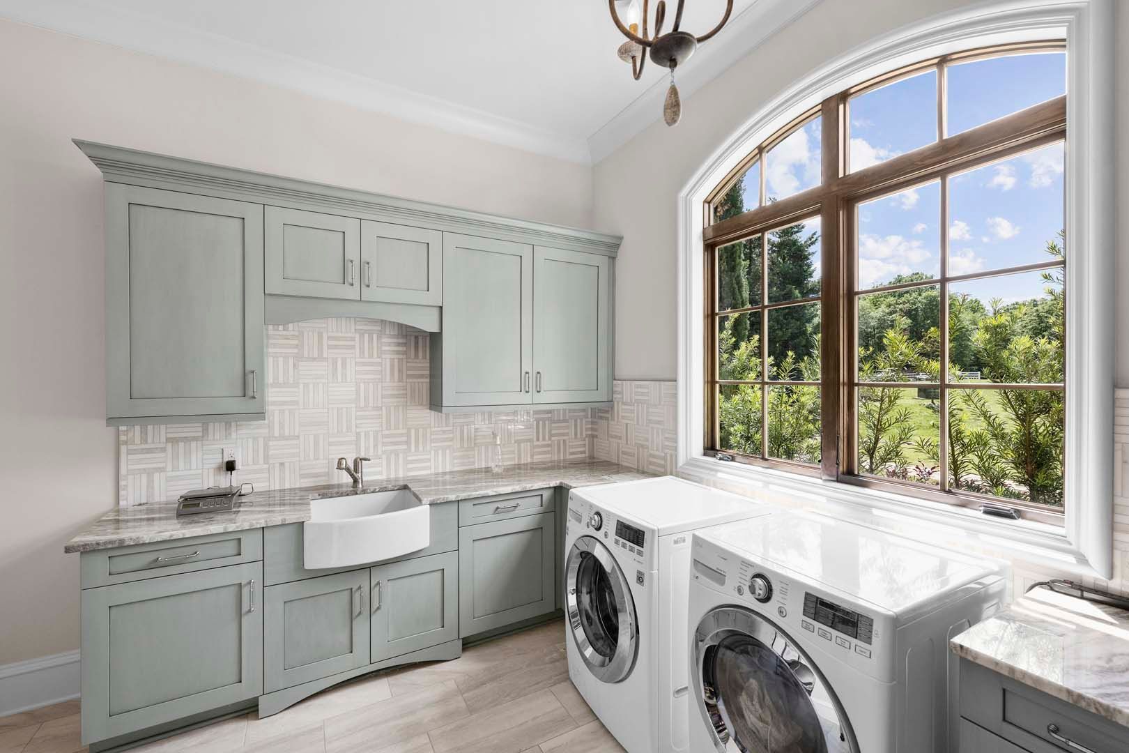 Laundry Room With Washer And Dryer — Charlotte, NC — Harland Building Group