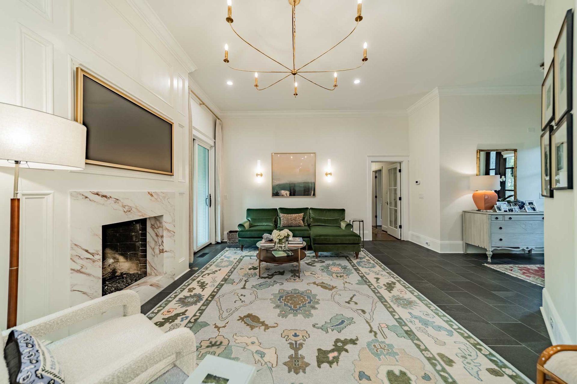 A living room filled with furniture and a fireplace.