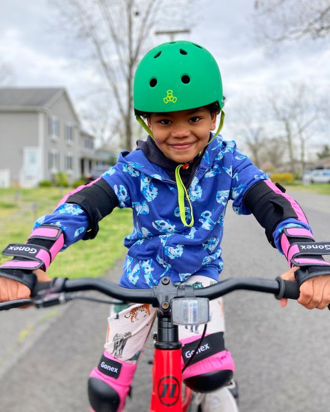 little girl learn how to bike
