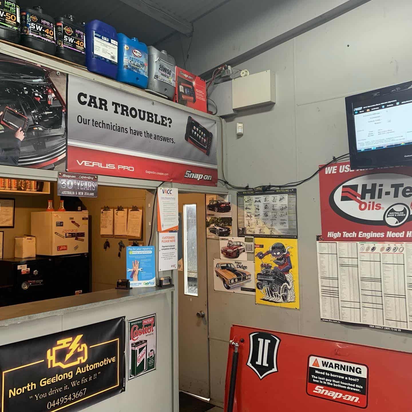 A Car Repair Shop With A Sign That Says Car Trouble — North Geelong Automotive In North Geelong, VIC