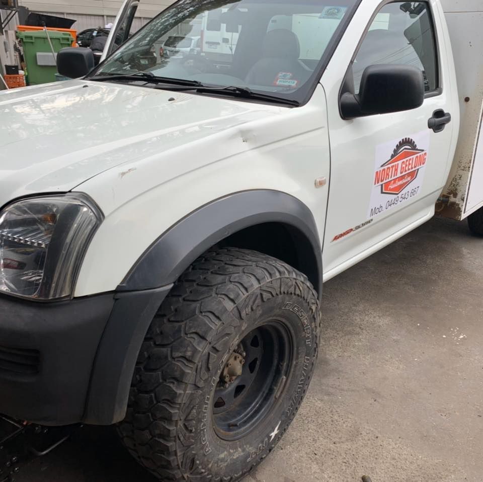 A White Truck Is Parked In A Parking Lot — North Geelong Automotive In North Geelong, VIC
